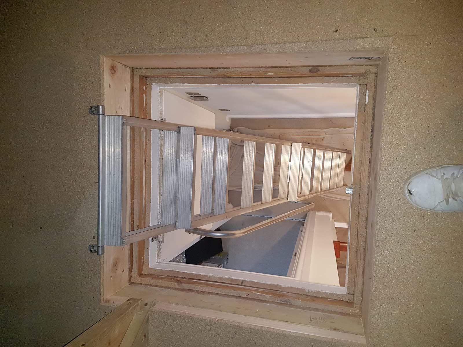Loft hatch enlargement service in London with new larger opening